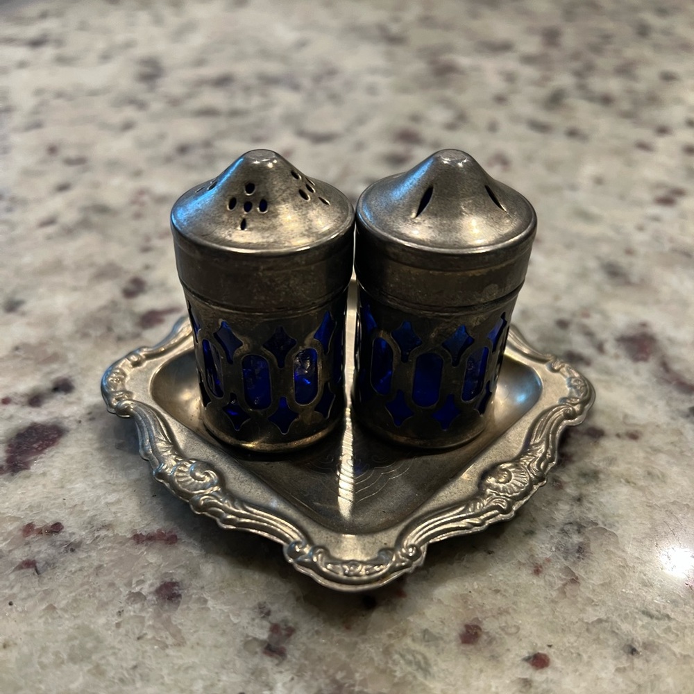 Vintage silver plated salt and pepper shakers with tray